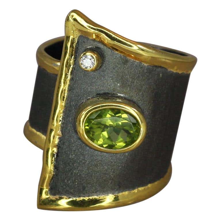 Eclyps Peridot and Diamond Ring in Fine Silver Ruthenium and 24 K Gold