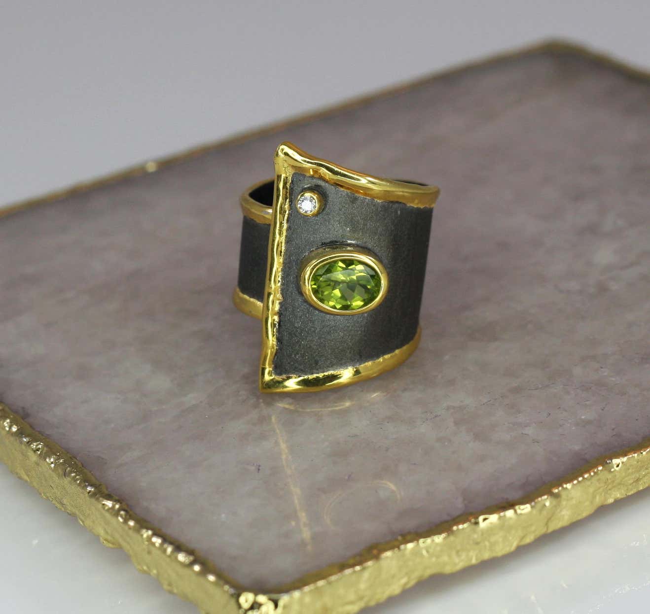 Eclyps Peridot and Diamond Ring in Fine Silver Ruthenium and 24 K Gold
