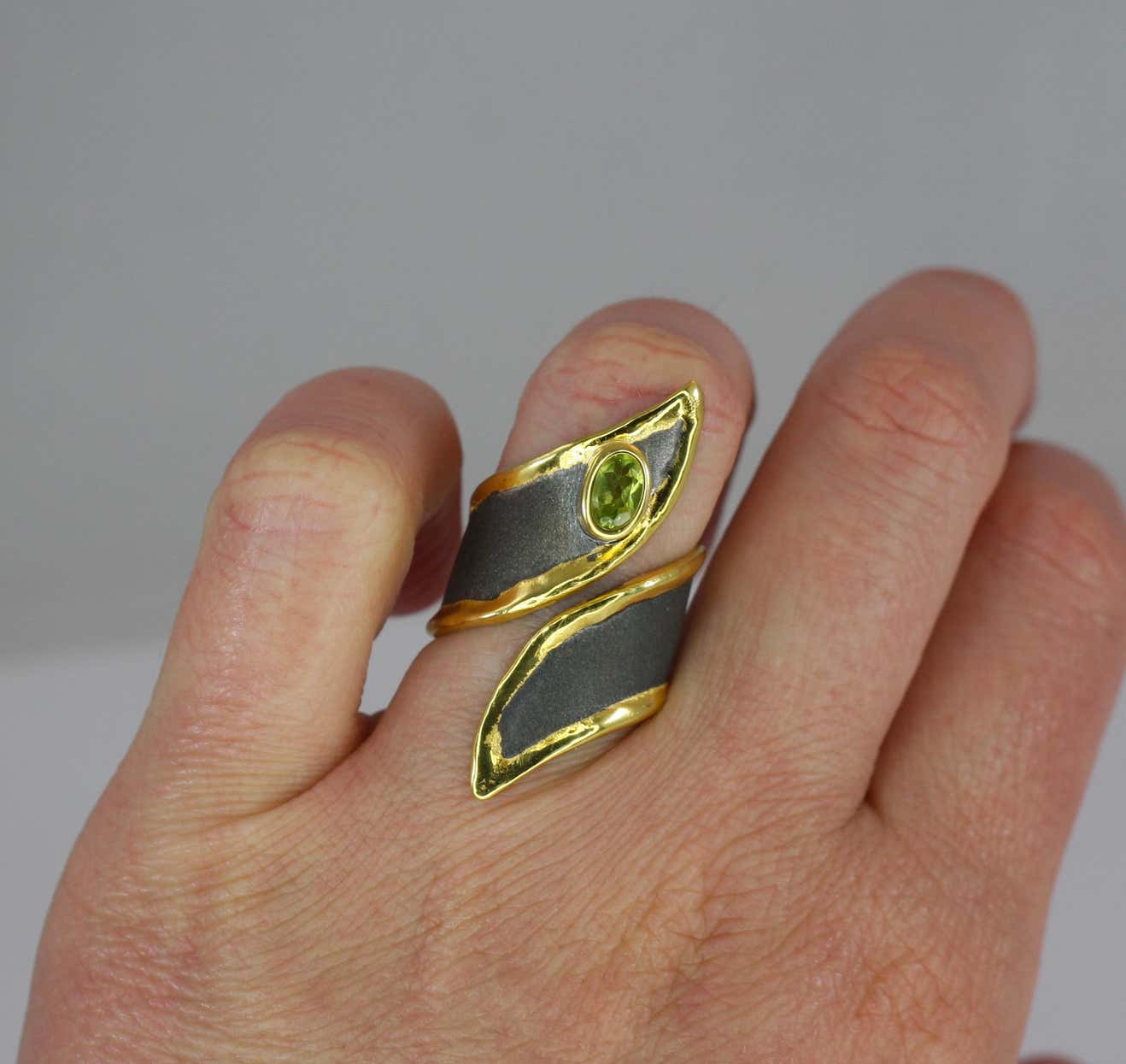 Eclyps Peridot Silver Ring Finished with Ruthenium and 24 Karat Gold