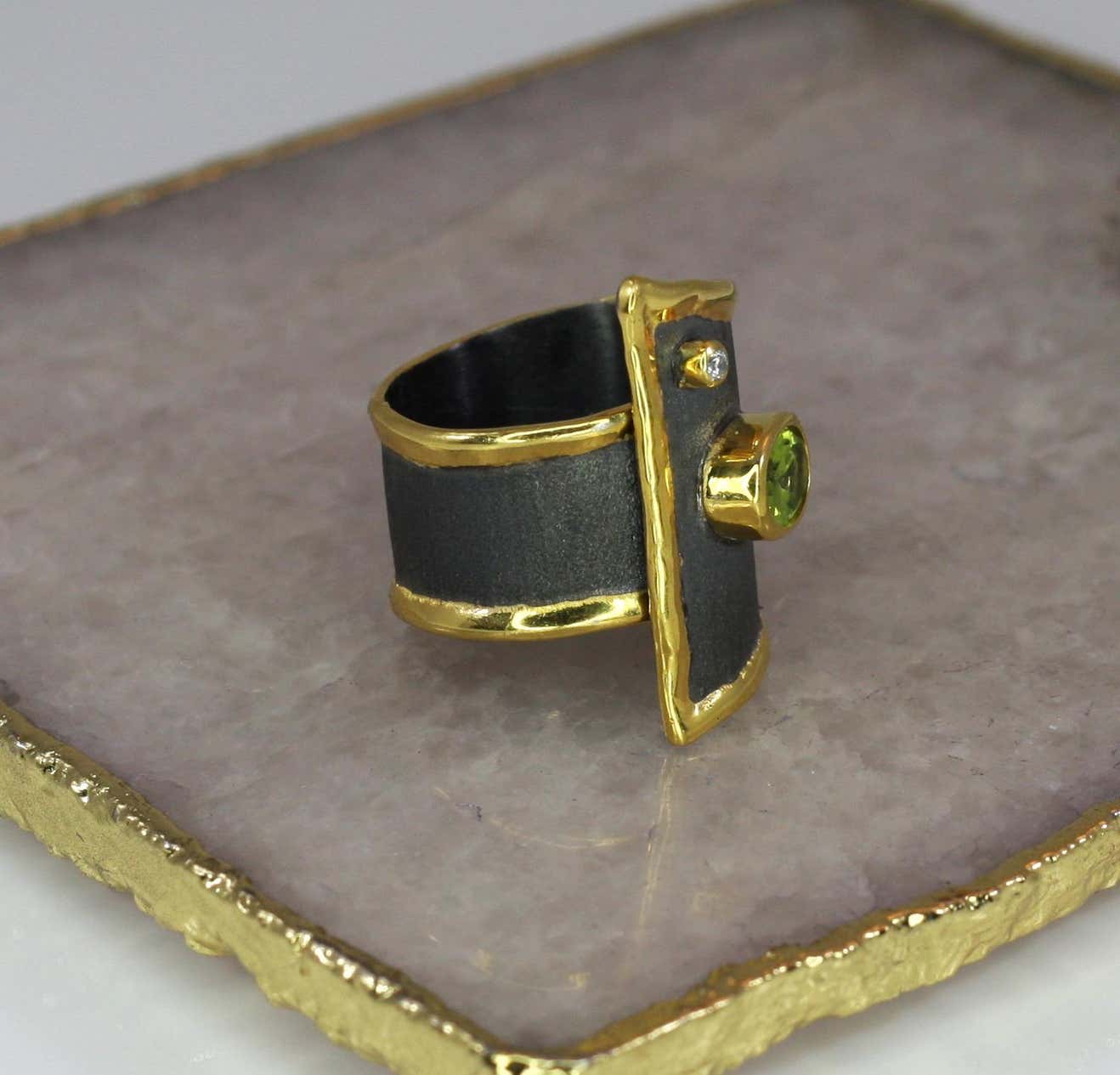 Eclyps Peridot and Diamond Ring in Fine Silver Ruthenium and 24 K Gold
