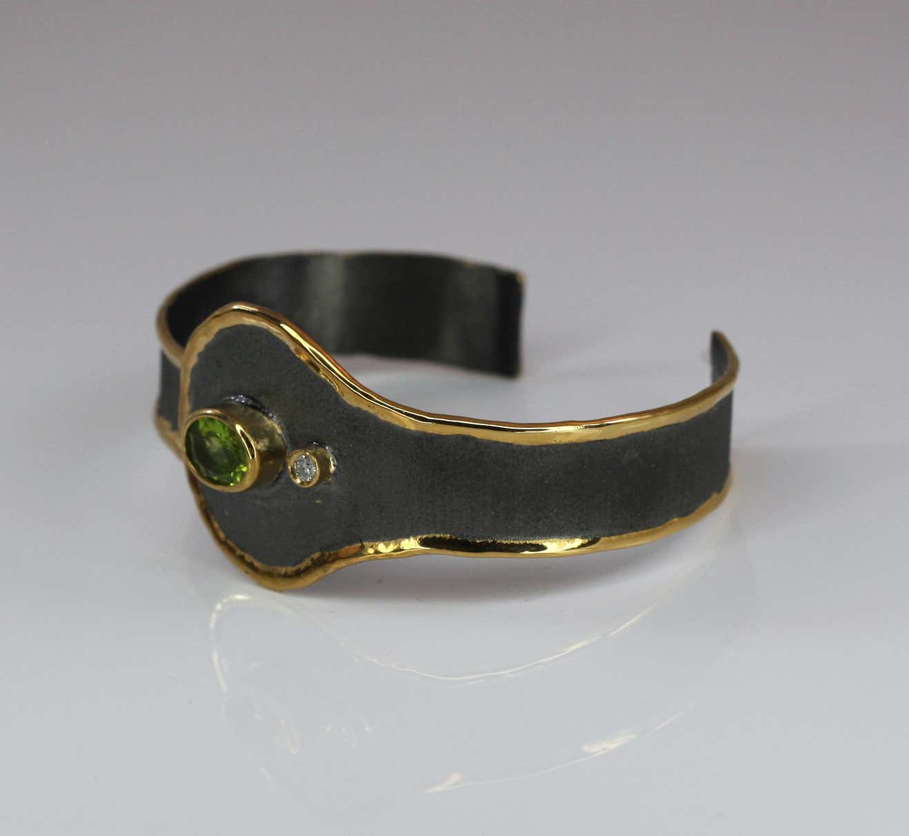 Eclyps Peridot and Diamond Silver Bracelet with Ruthenium and Pure Gold